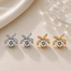 JM Collection Brinco Laço com Zircônia Central Dourado e Prata Acabamento Premium Zircônia Brilhante Elegância e Versatilidade