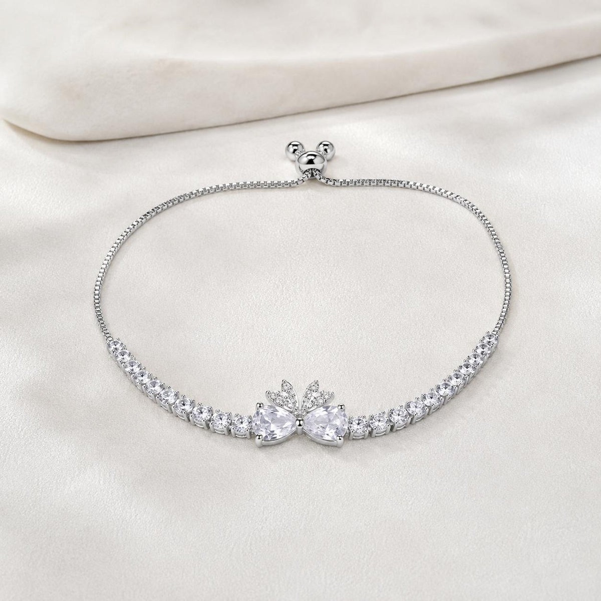 Pulseira Ajustável Laço com Dois Corações e Zircônias Brilhantes | Pulseira Feminina Dourada e Prateada Acessório Elegante para Presente