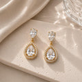 Brinco Gota Dupla com Zircônias Halo Elegância e Brilho Luxuoso Acessório Versátil para Glamour e Sofisticação