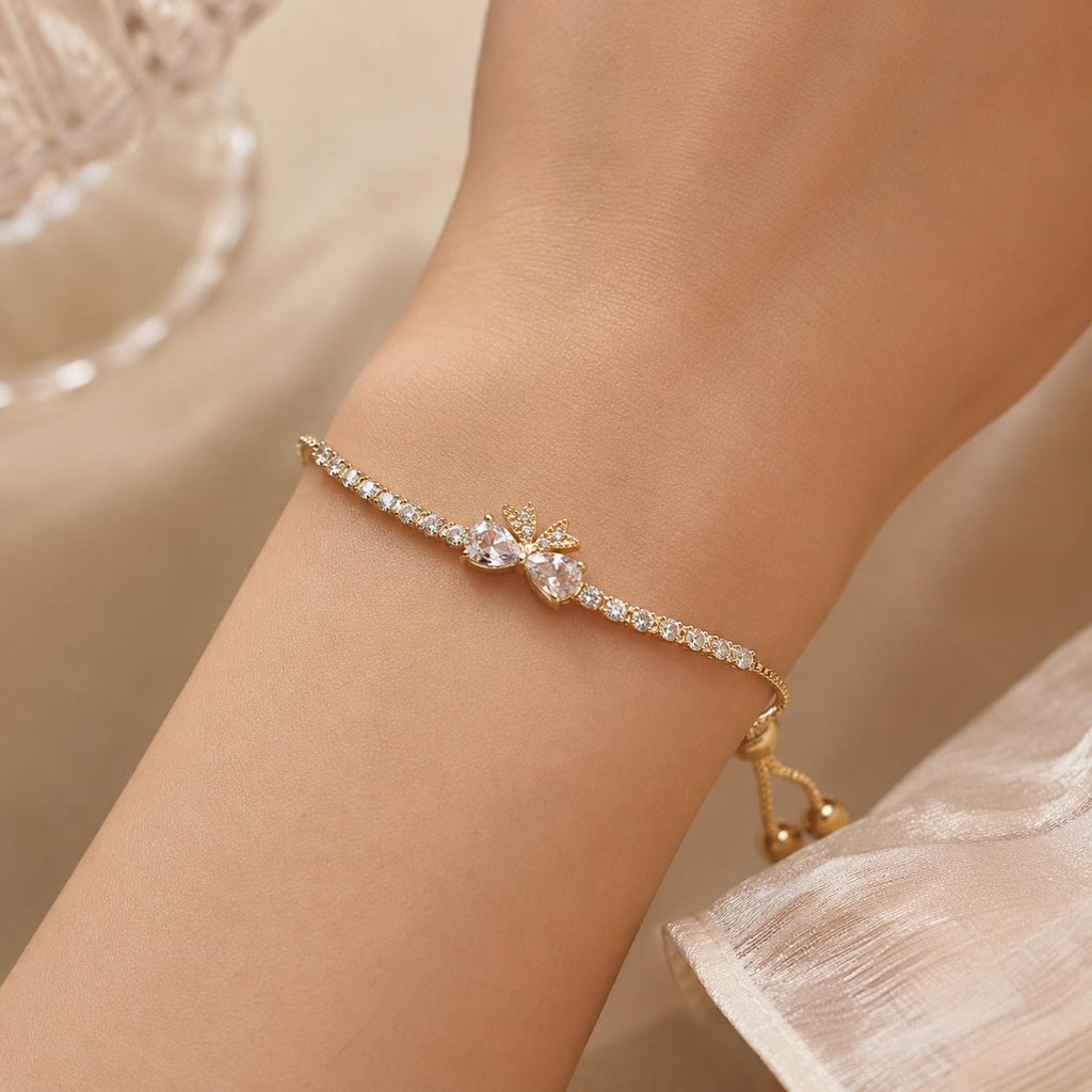 Pulseira Ajustável Laço com Dois Corações e Zircônias Brilhantes | Pulseira Feminina Dourada e Prateada Acessório Elegante para Presente