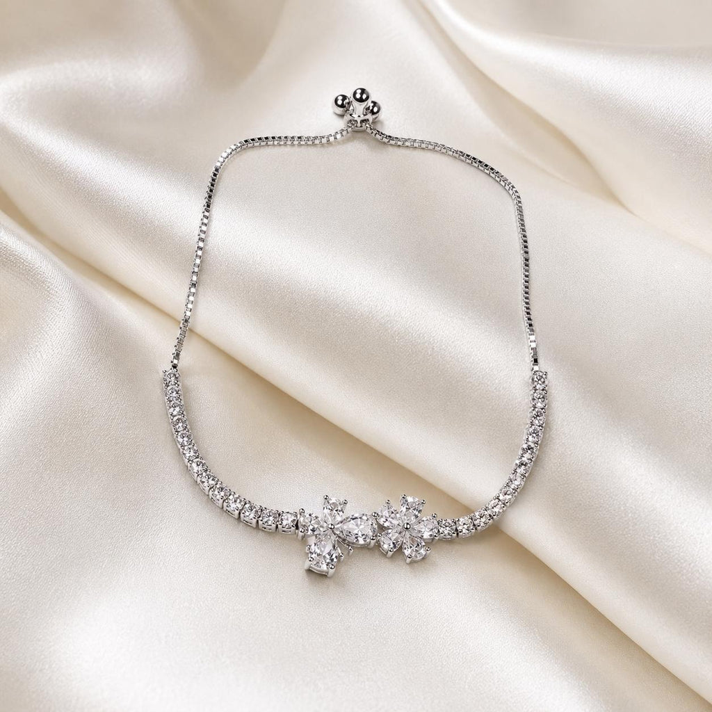 Pulseira Ajustável Duas Flores com Zircônias Brilhantes | Pulseira Feminina Dourada e Prateada Acessório Delicado Luxuoso para Presente