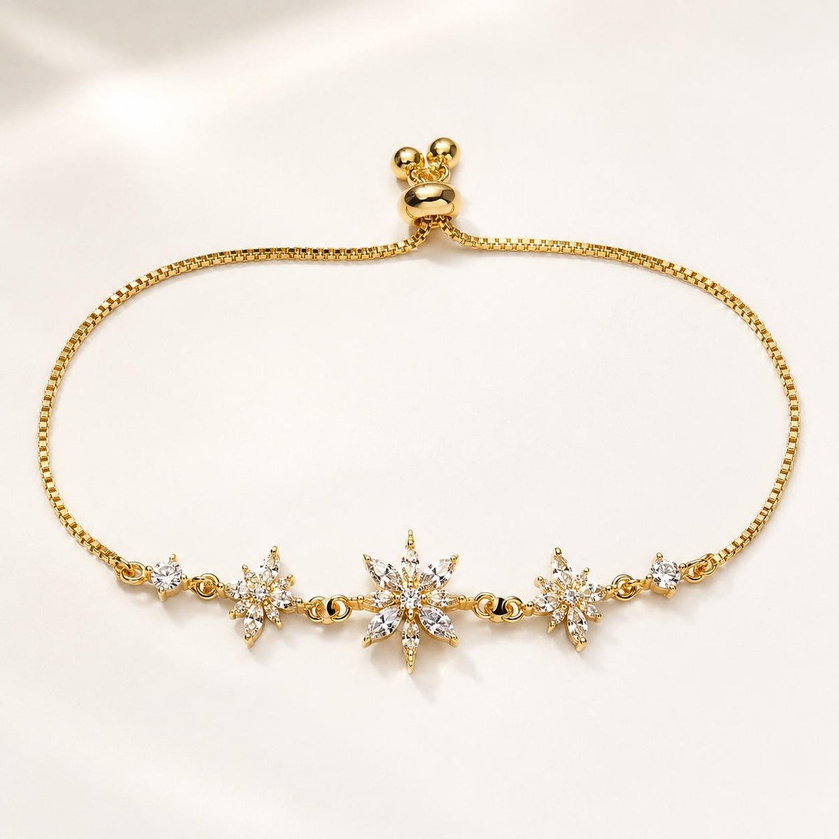 Pulseira Ajustável de Flocos de Neve com Zircônias Brilhantes | Pulseira Feminina Dourada e Prateada Acessório Delicado para Presente